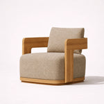 Cargar imagen en el visor de la galería, Sillón tapizado beige con estructura de madera y diseño curvo contemporáneo
